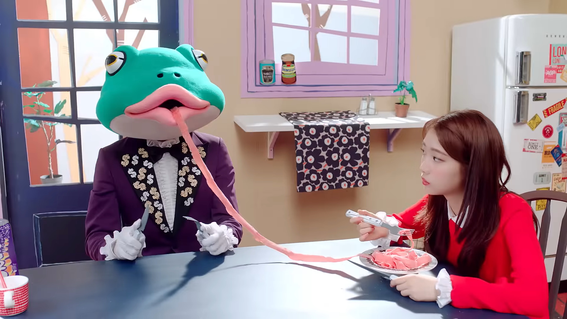 The frog's tongue stretching out into a bowl, which Yeojin eats from.